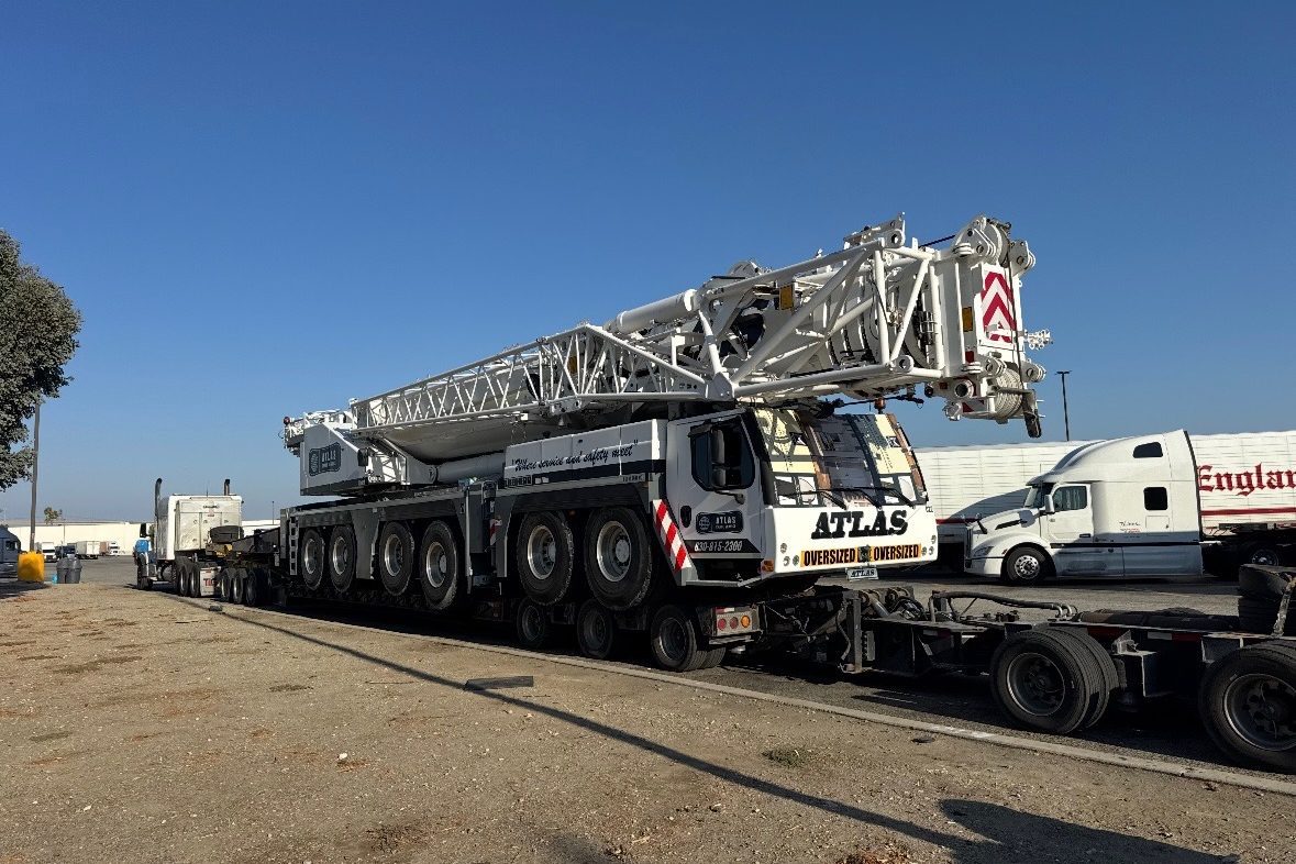 All terrain crane staged for an oversize move with boom dolly
